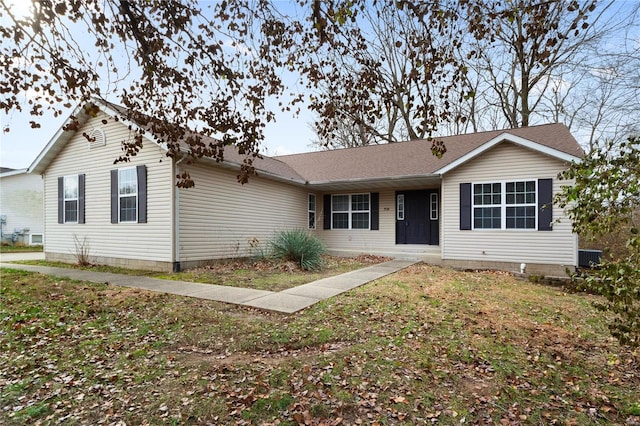 single story home featuring a front yard