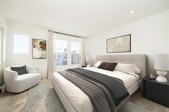 carpeted bedroom featuring recessed lighting