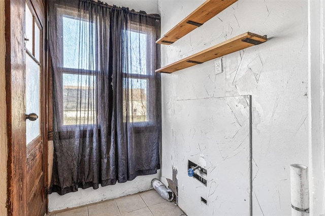 bathroom featuring tile patterned flooring