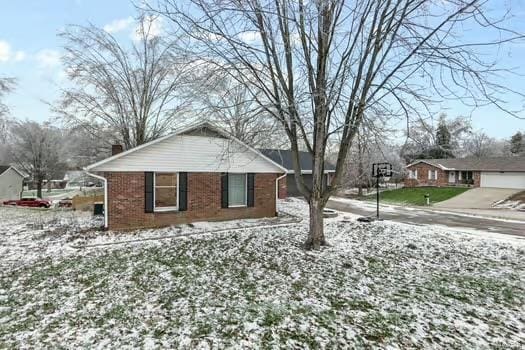 view of snow covered property