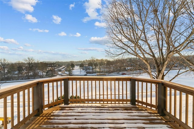 view of snow covered deck