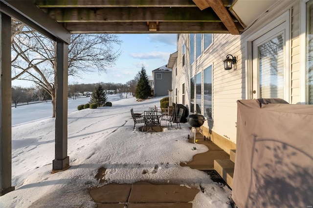 view of snow covered patio