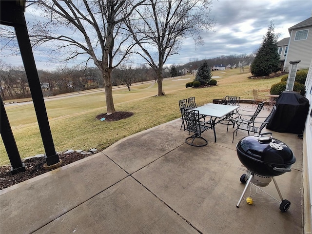 view of patio featuring outdoor dining space and grilling area