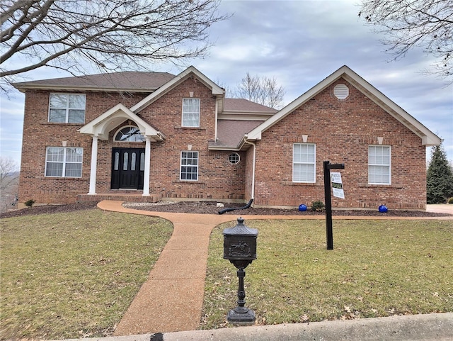 front of property with a front yard