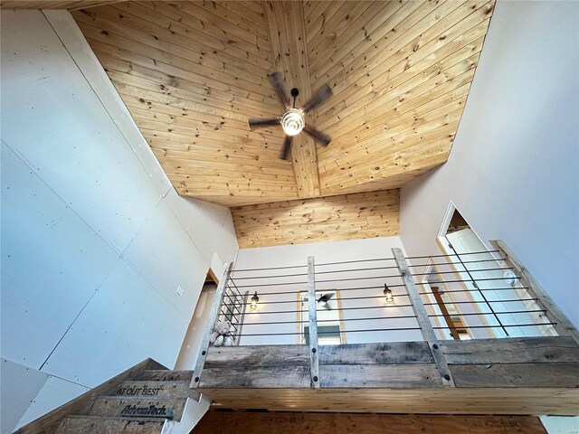 interior details with ceiling fan and wooden ceiling