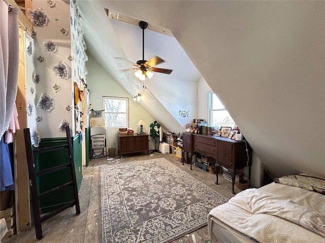 bedroom featuring ceiling fan and lofted ceiling