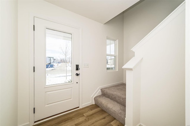 doorway to outside featuring light wood-type flooring