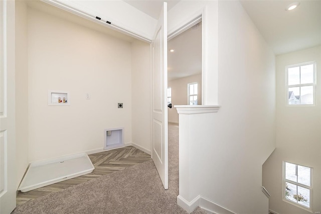 washroom featuring hookup for a washing machine, parquet flooring, and hookup for an electric dryer