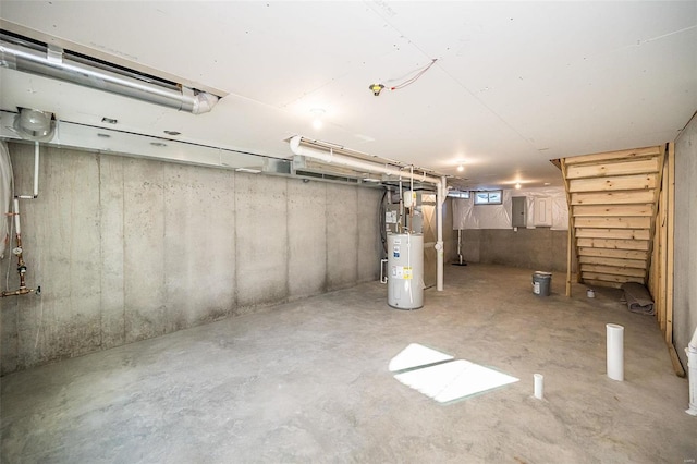 basement with water heater and electric panel