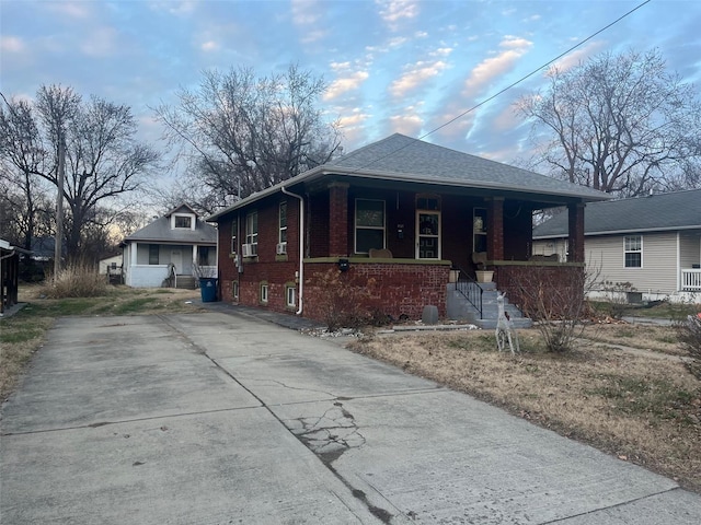 bungalow-style house with covered porch