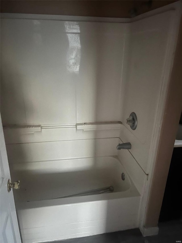 bathroom with shower / washtub combination