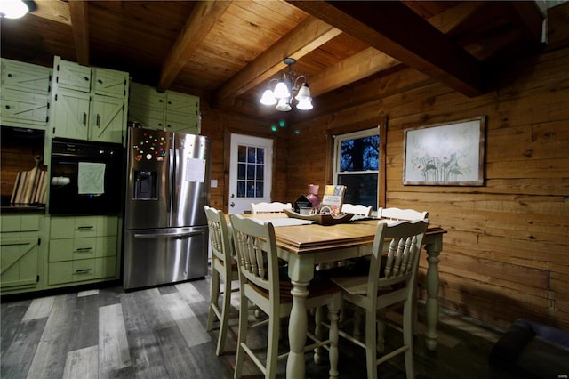 dining area featuring an inviting chandelier, beam ceiling, wooden walls, dark hardwood / wood-style flooring, and wooden ceiling