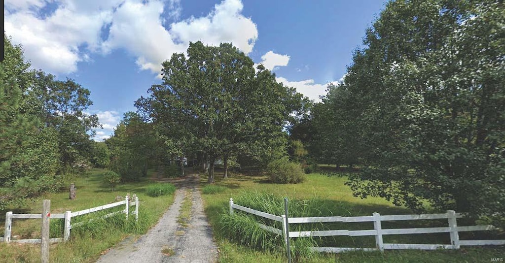 view of road with a rural view