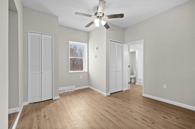 unfurnished bedroom featuring ceiling fan and light hardwood / wood-style floors