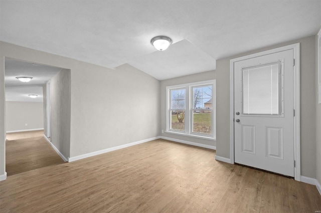 empty room with light hardwood / wood-style floors