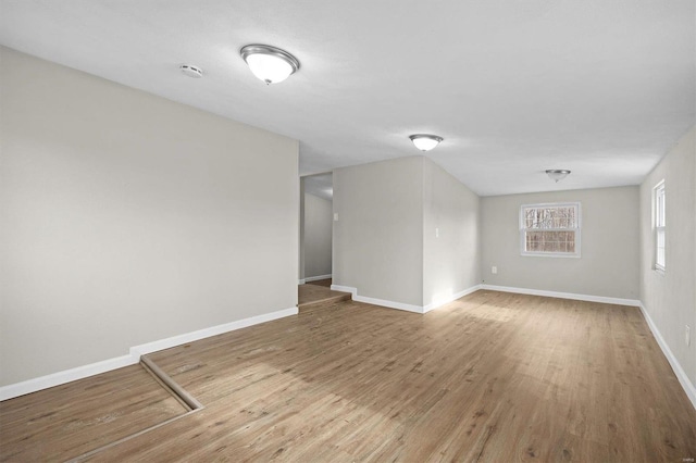 empty room featuring hardwood / wood-style flooring