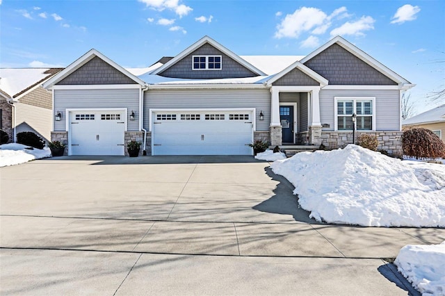 craftsman-style home with a garage