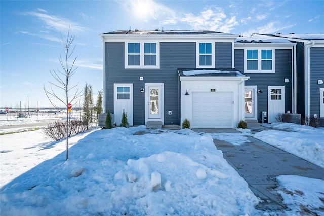 view of front of property with a garage