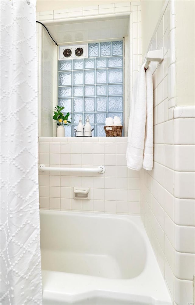 full bath featuring a shower with curtain