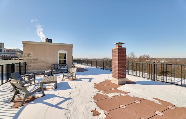 view of patio / terrace featuring fence