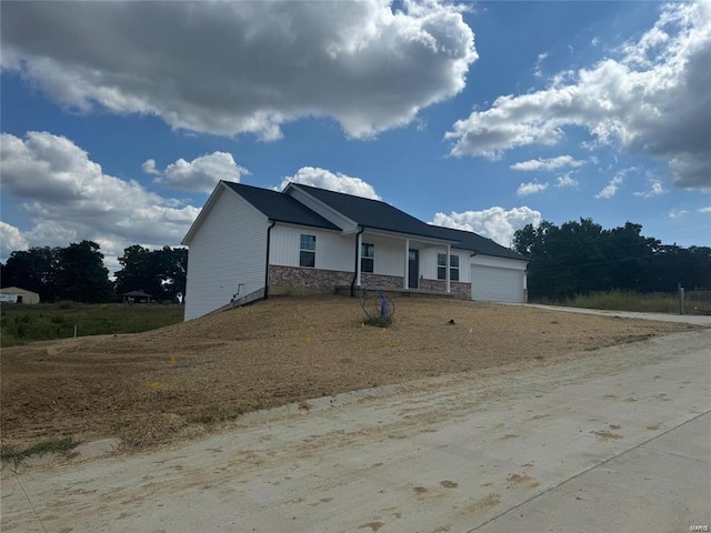 view of front of home featuring a garage