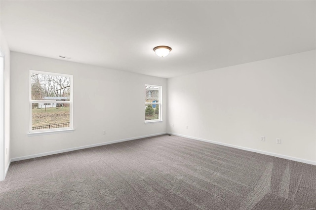 empty room with carpet floors