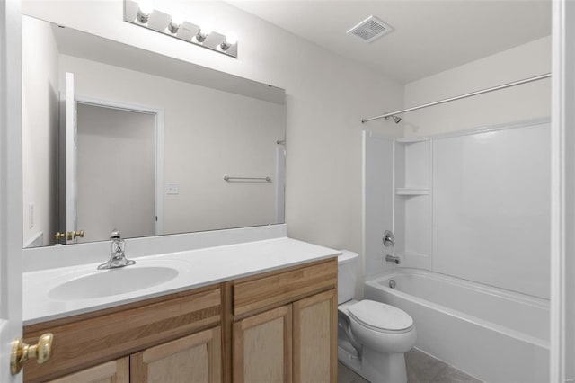 full bathroom featuring shower / bathing tub combination, vanity, toilet, and tile patterned floors