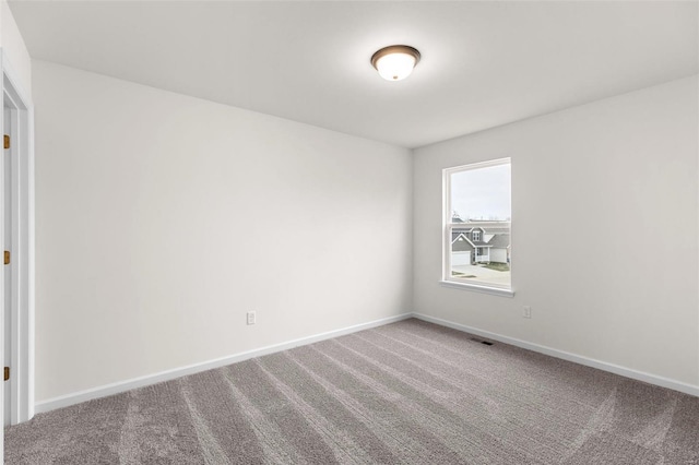 view of carpeted spare room