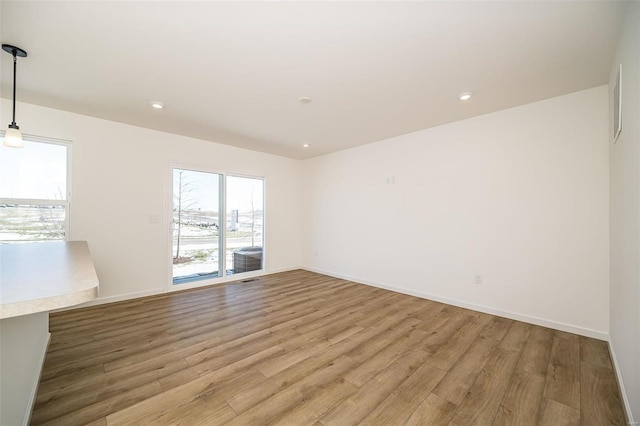 empty room featuring light hardwood / wood-style floors