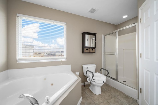 bathroom featuring tile patterned floors, toilet, and shower with separate bathtub