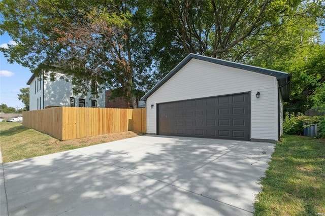 detached garage with fence