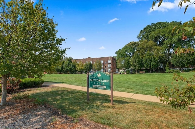 view of community featuring a lawn