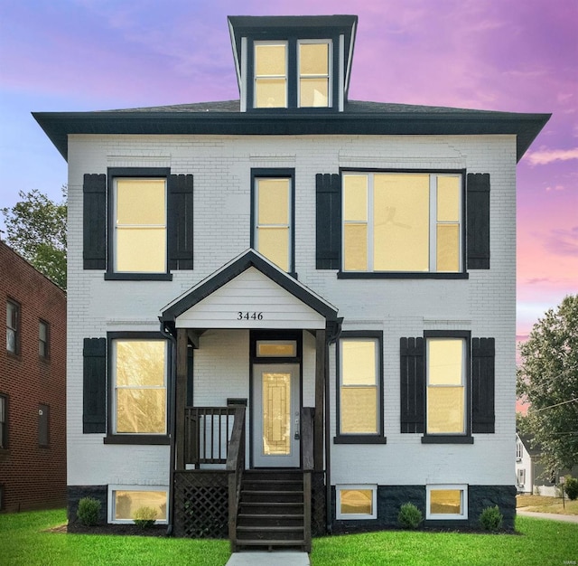 view of front of property with brick siding