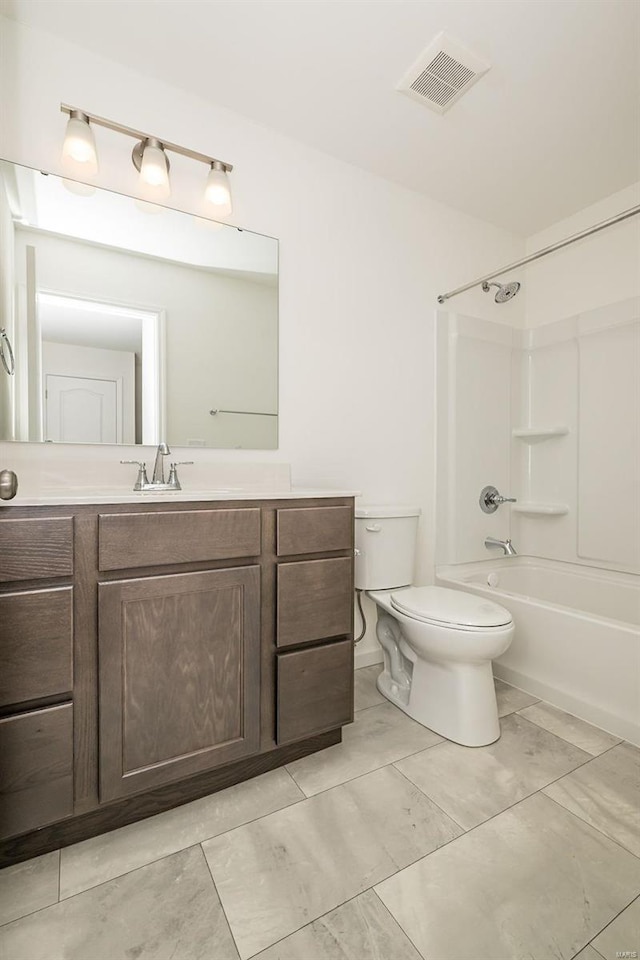 full bathroom with bathtub / shower combination, toilet, and vanity