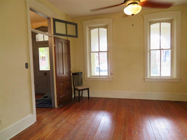 unfurnished room featuring wood-type flooring and ceiling fan