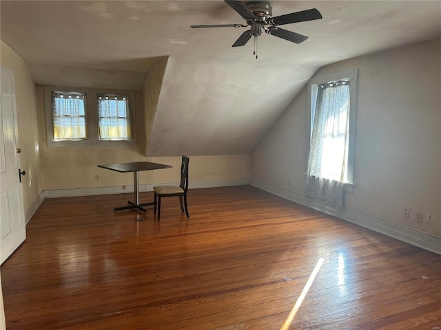 bonus room with hardwood / wood-style floors, ceiling fan, and lofted ceiling