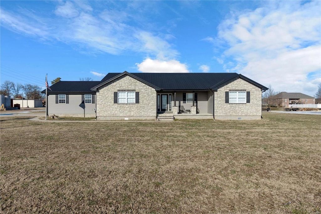 ranch-style house with a front lawn