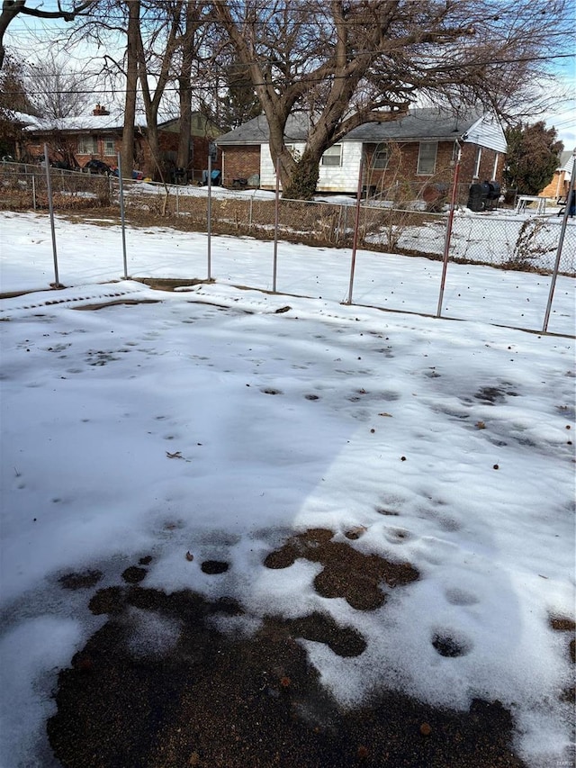 view of yard covered in snow