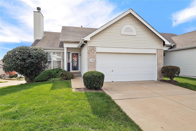 single story home featuring a garage and a front lawn