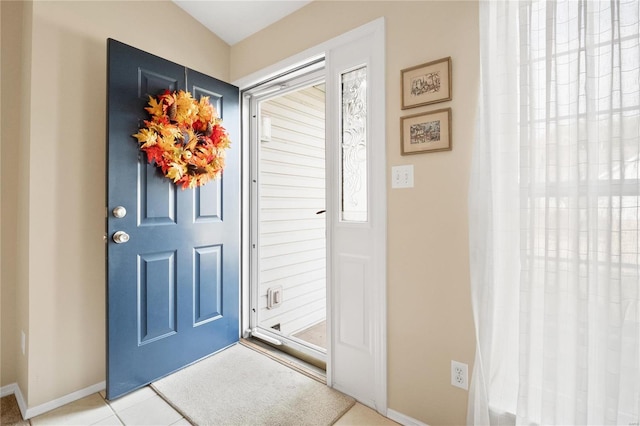 view of tiled foyer entrance