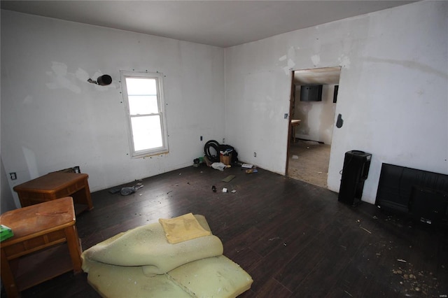 unfurnished room with dark hardwood / wood-style floors