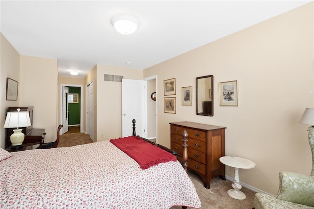 carpeted bedroom featuring a closet