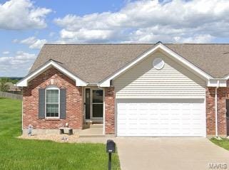 ranch-style house with a front lawn and a garage