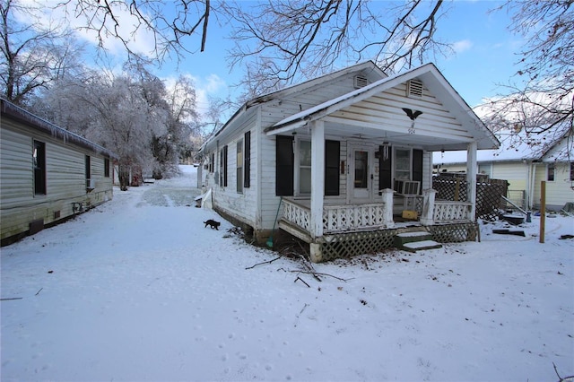 bungalow-style home with covered porch