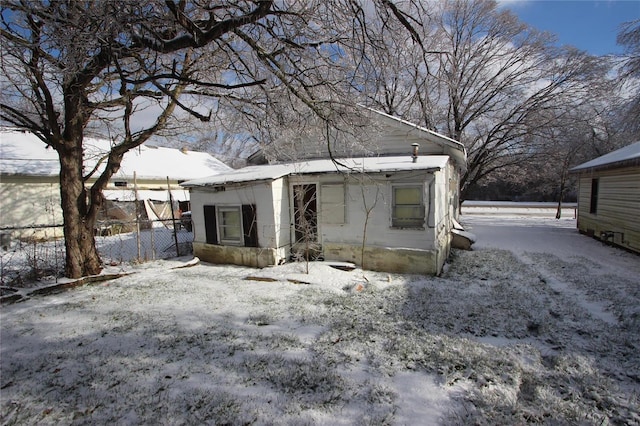 view of snow covered property