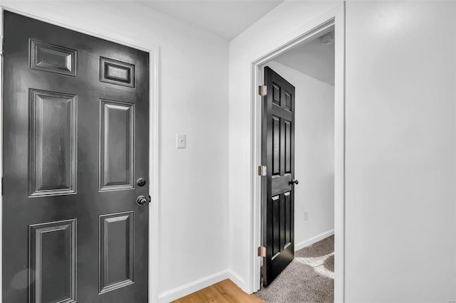 hall with light wood-type flooring