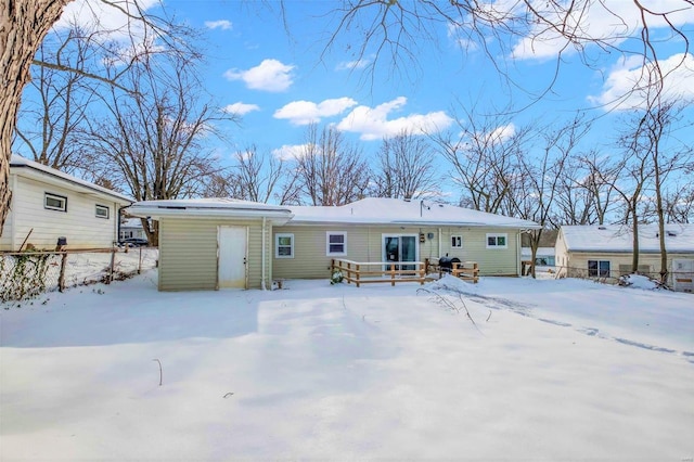 view of snow covered property