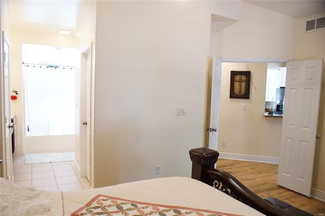 bedroom with light hardwood / wood-style flooring