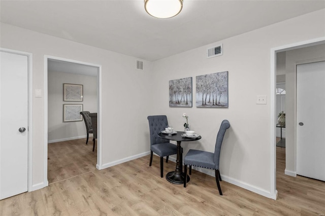 dining area featuring light hardwood / wood-style floors