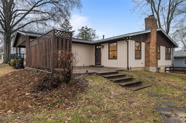 rear view of house with a patio